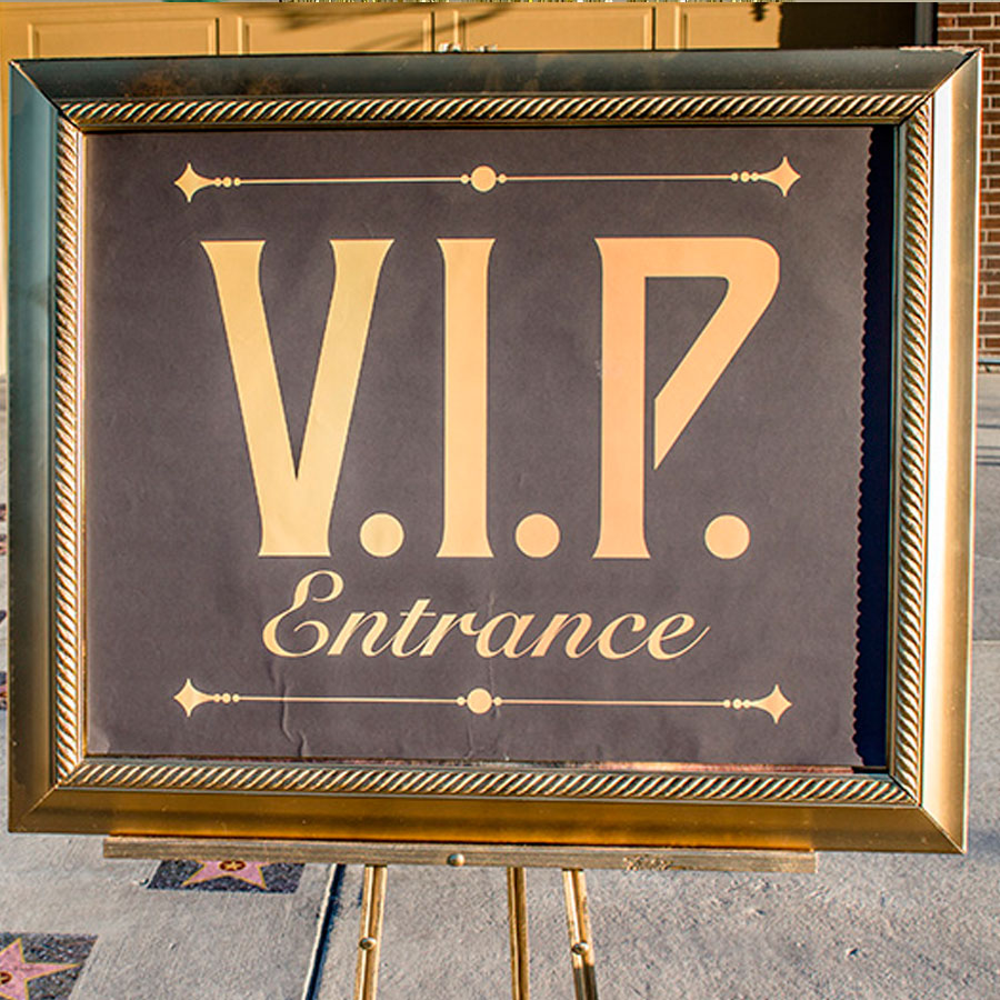 V.I.P. entrance sign with elegant decor for a glamorous event, adding a special touch to a pageant-themed mystery party.
