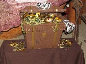 a box with gold and silver jewelry