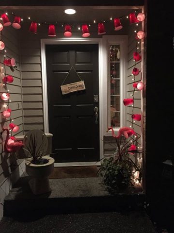 a door with decorations and a toilet