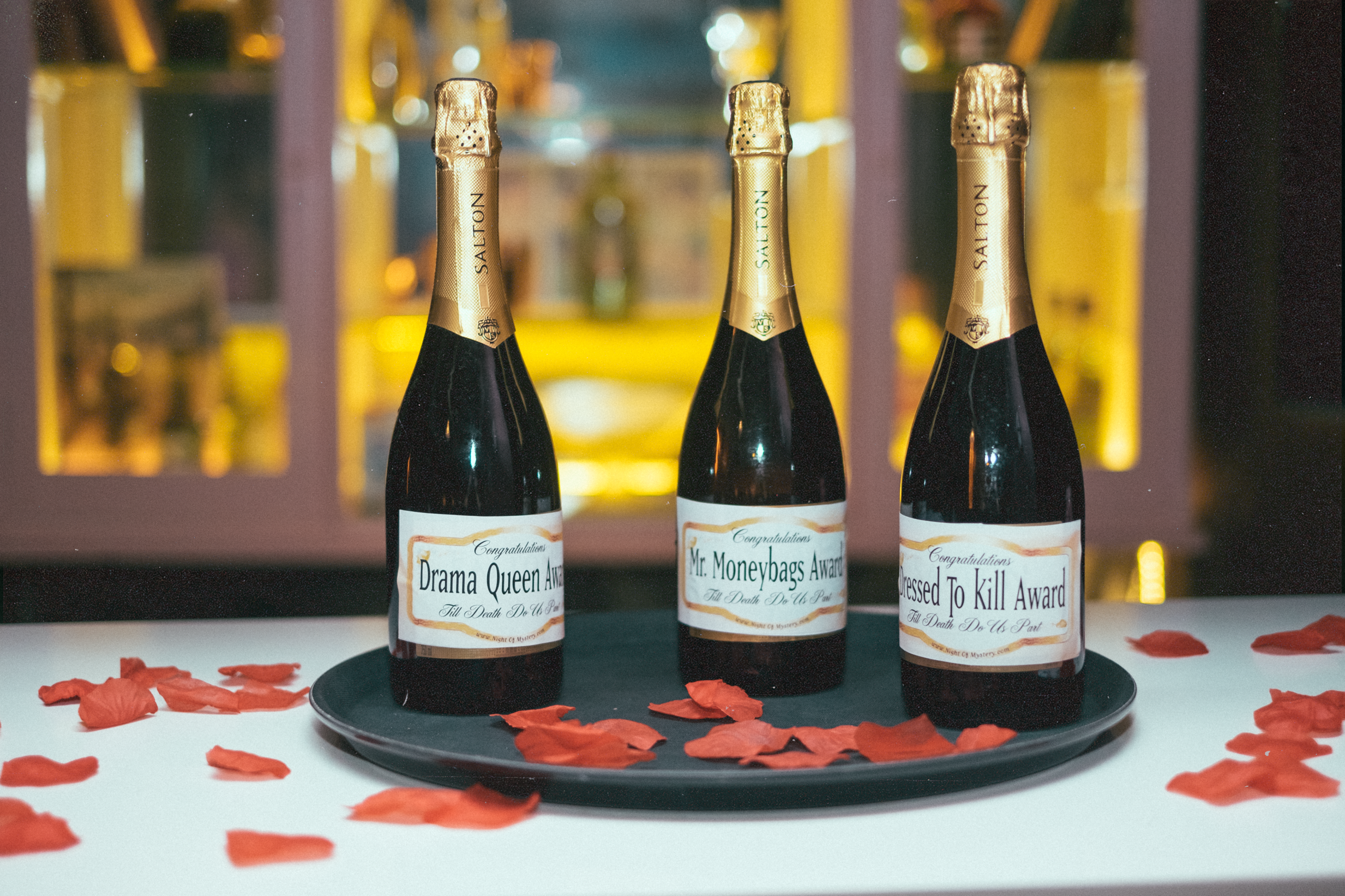 Night of Mystery | Party of the Month: Till Death Do Us Part — A Brazilian Wedding to Die For Reception table decor featuring elegant dinnerware and immersive mystery party details