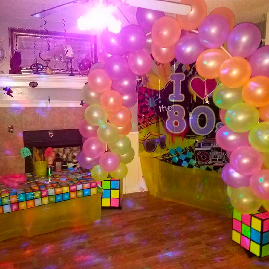 Charlize Theron Celebrates Her Birthday with an 80s Prom Murder Mystery Party