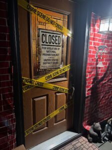 Entrance to Murder at THe Juice Joint murder mystery party game