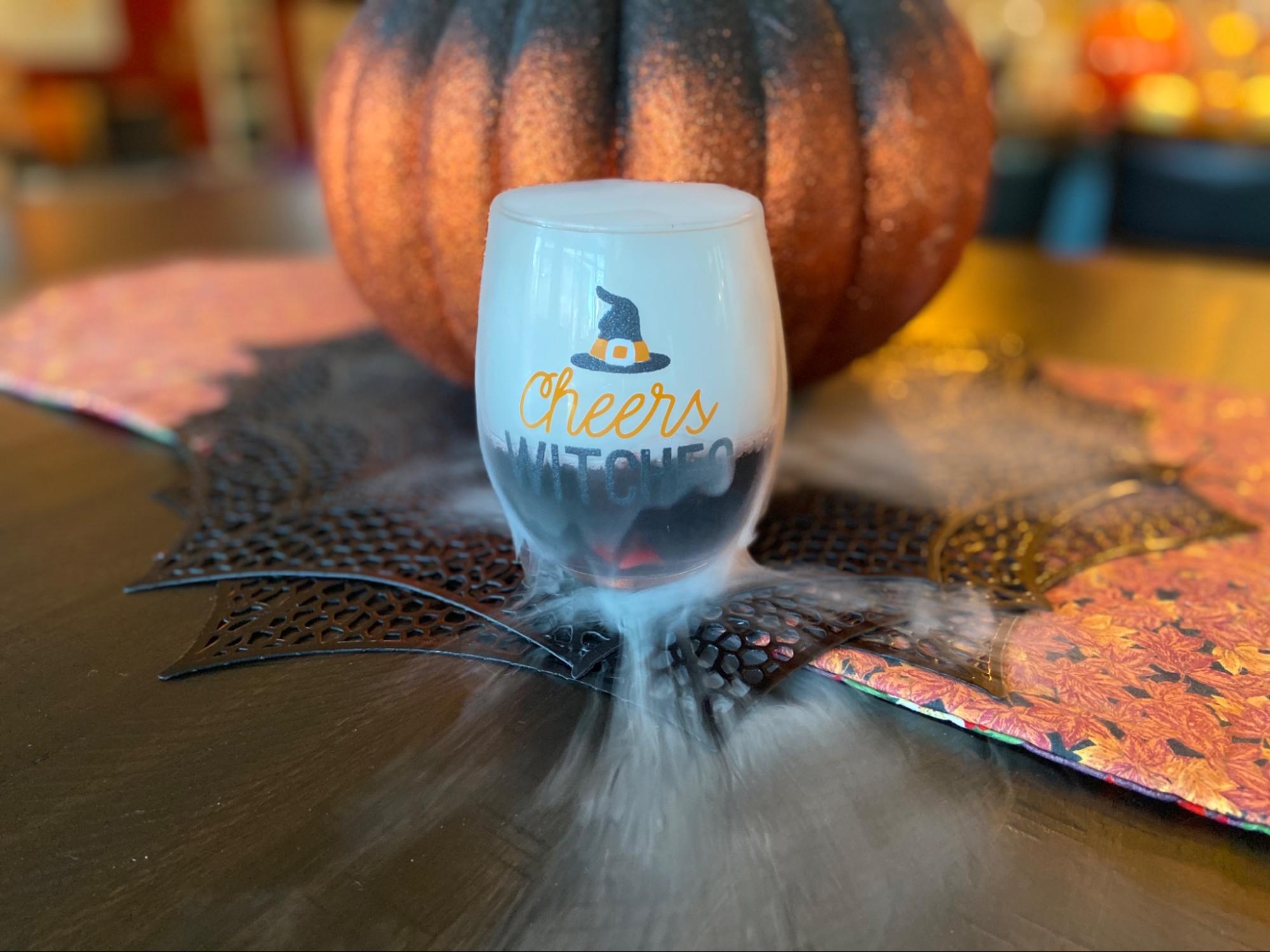 Halloween party table with fog effects from dry ice.