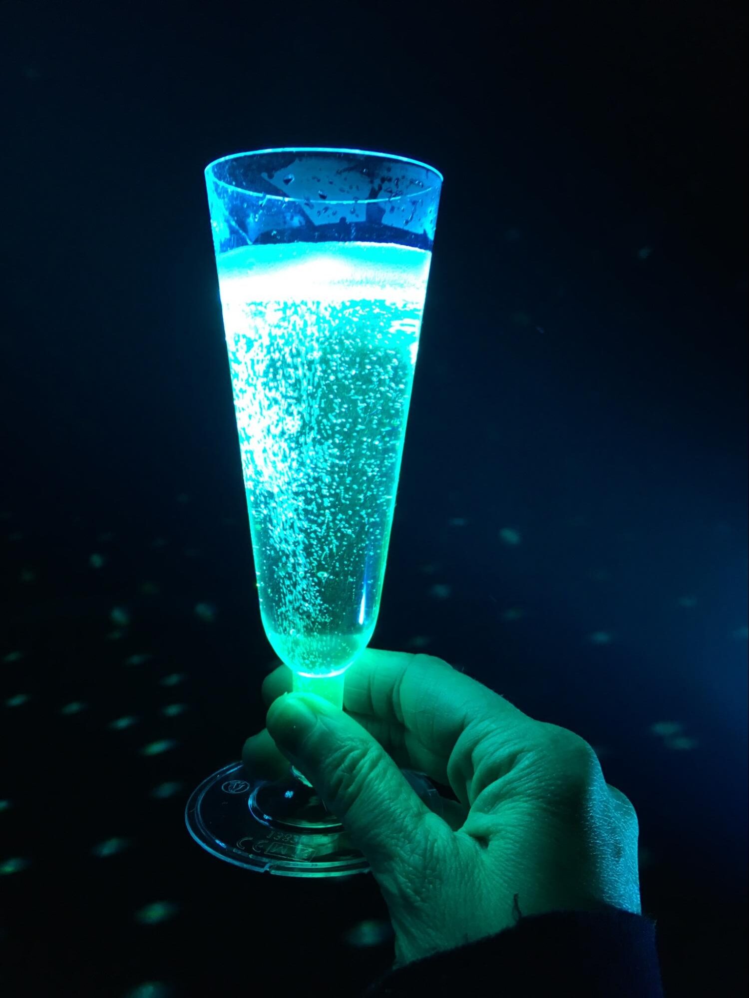 Blacklight setup for glowing Halloween cocktails.
