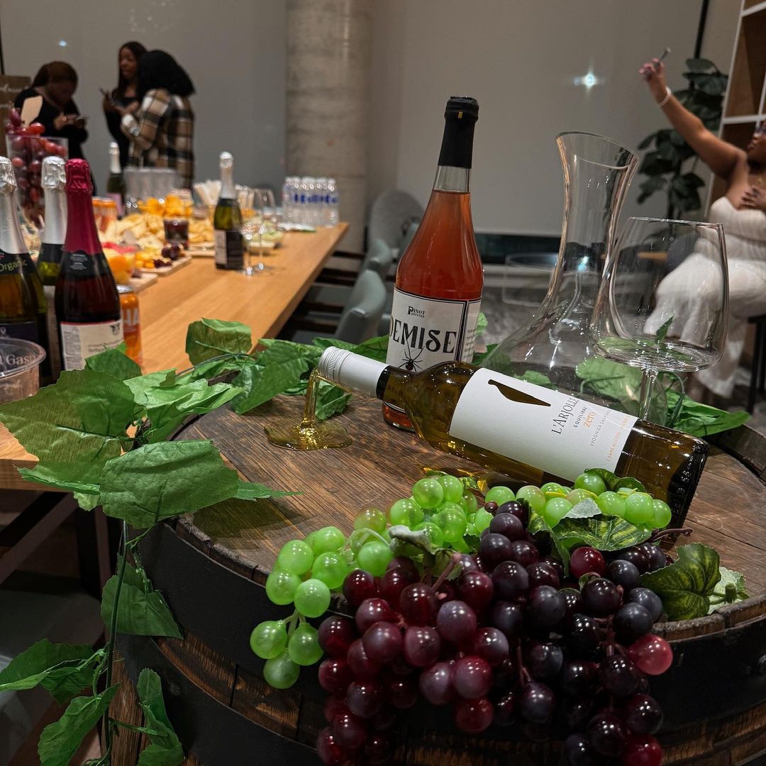 Fall winery setup with grape stomping theme for a Friendsgiving murder mystery party.