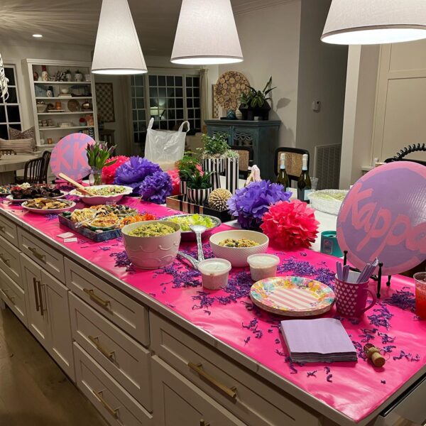 Galentine’s party snack ideas including charcuterie hearts, pink popcorn, and themed desserts