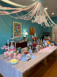 Night of Mystery | Murder Mystery Party Games Hub Galentine’s party snack ideas including charcuterie hearts, pink popcorn, and themed desserts