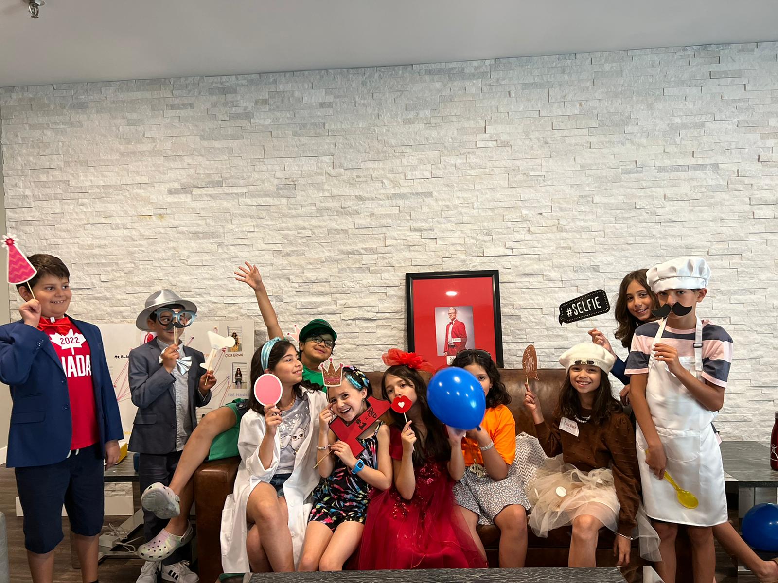 Kids enjoying a mystery birthday party game and solving clues together