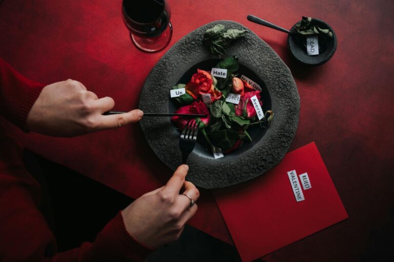 Night of Mystery | Surprise Birthday Party Ideas for Adults That Actually Stay Secret Mysterious Person Cutting Flowers on Dining Table