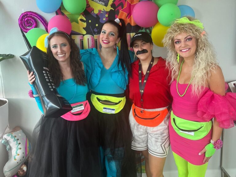 Night of Mystery | Surprise Birthday Party Ideas for Adults That Actually Stay Secret Retro 90s Party Clothes With Colorful Fanny Packs